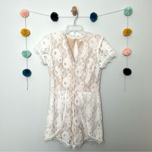 Francesca’s White and Cream Lace Romper